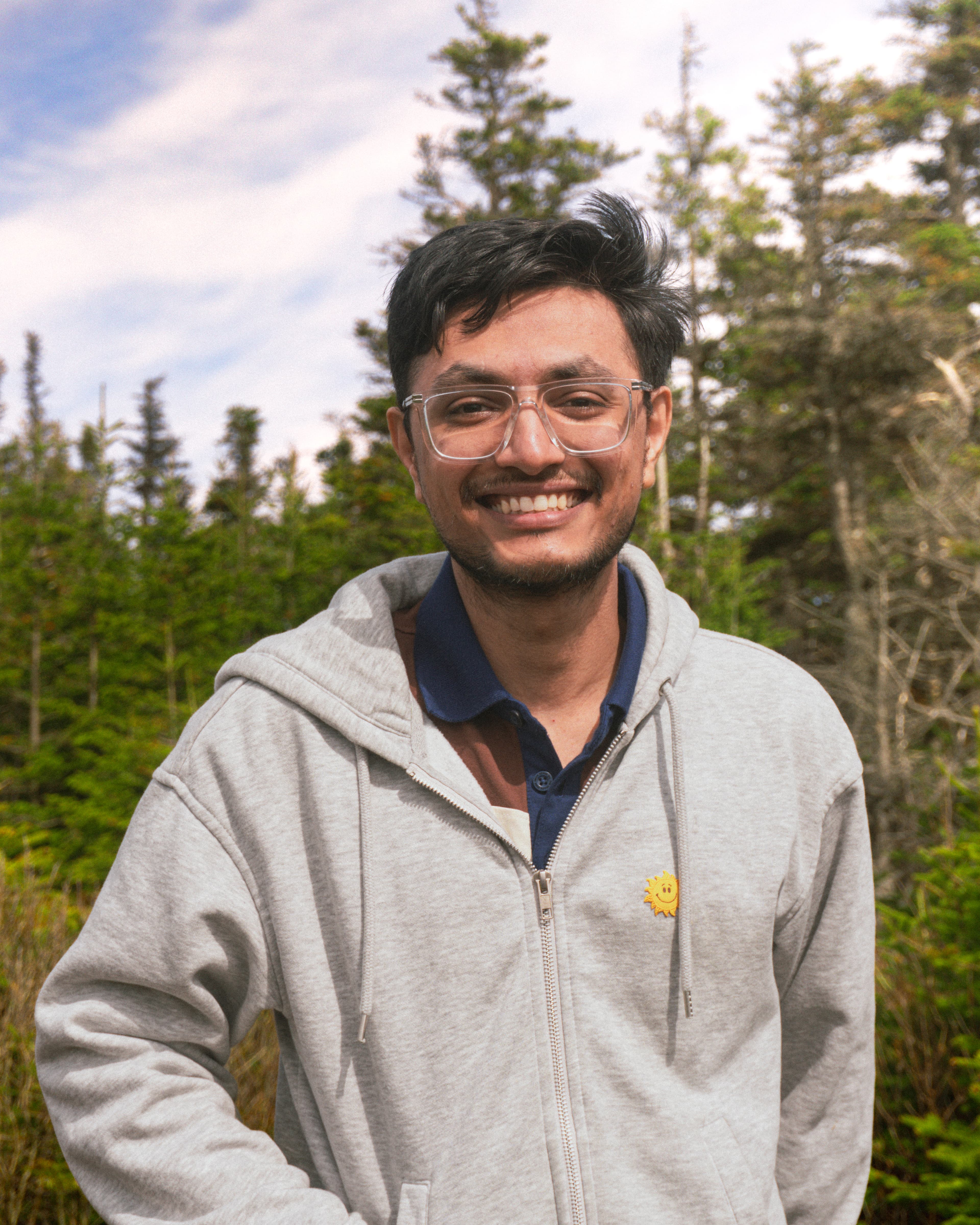 Vedant — standing portrait, open sky